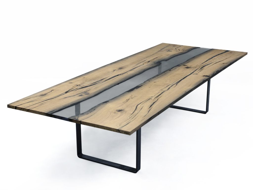 table made of wood and resin base in a light brown tone on a steel base on a white backgroudn