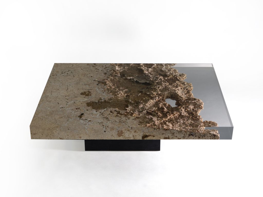 small plate made of natural stone and transparent glass in a brown tone on a white background
