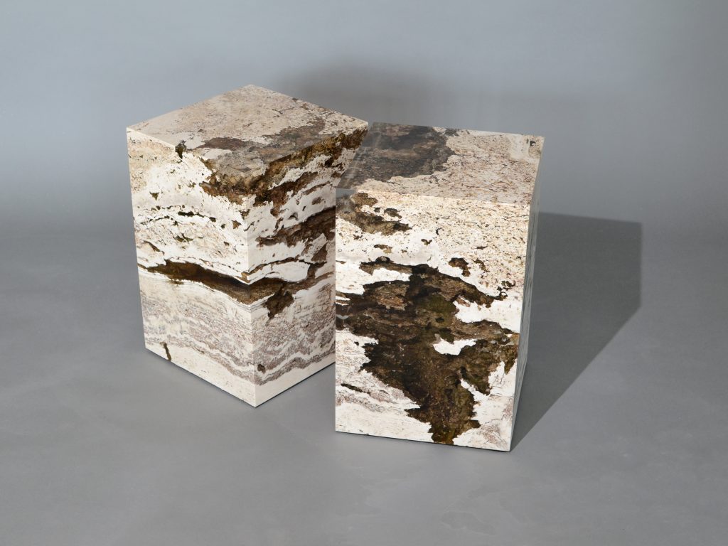 small sculpture made of natural stone covered in resin completely in a tone of brown and beige