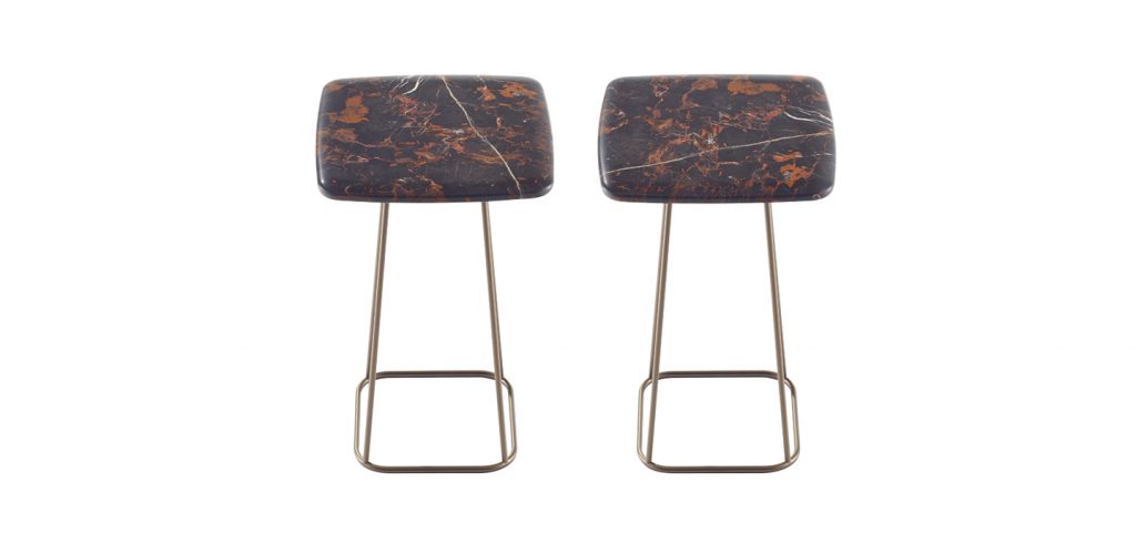 two small side tables made of gold steel base and brown marble top on a white background