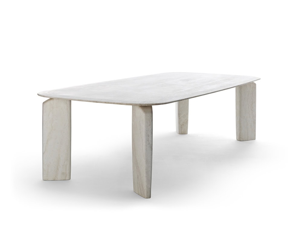 A Giotto Outdoor Dining Table with a rectangular white marble top and block legs is shown on a white background