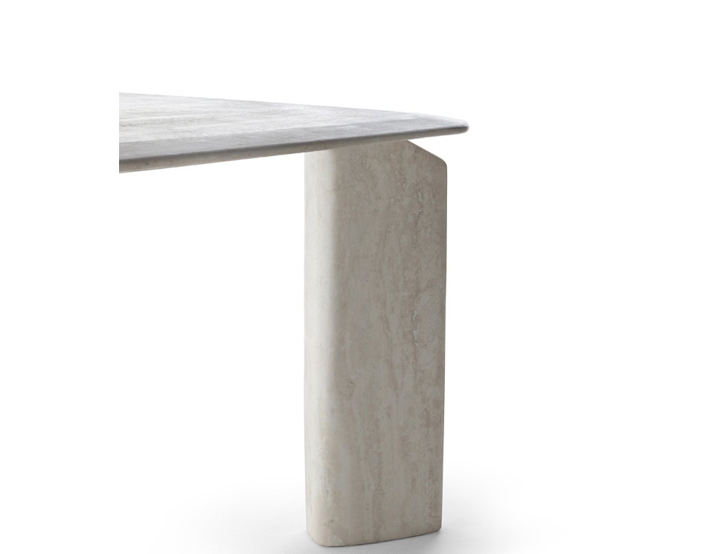 A close-up of a Giotto Outdoor Dining Table shows a white marble tabletop edge and a rectangular leg against a white background