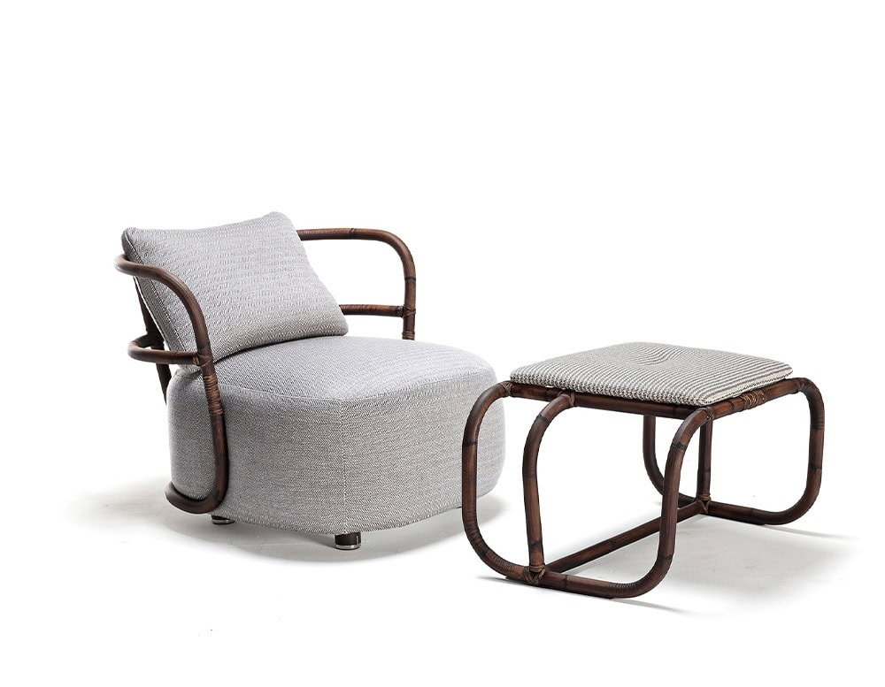 Jungle Pouf upholstered in gray fabric and brown wooden structure on a white background.