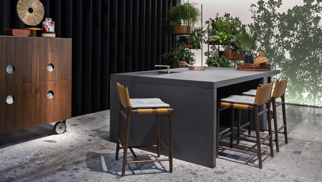 kitchen table with chairs made of latest generation materials in a tone of gray and brown on the chairs