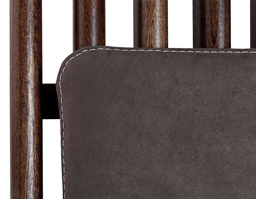 Closeup of Panarea Coffee Table. Upper part made of brown wooden sticko on a white background.