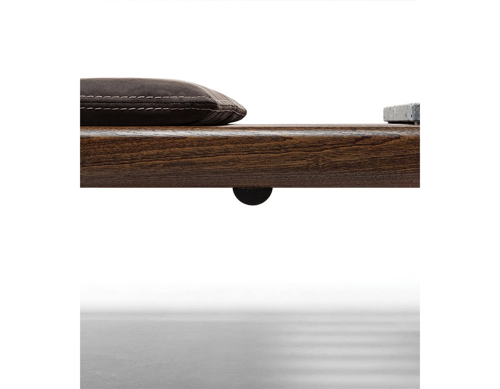 Closeup of Panarea Coffee Table. Upper part made of brown wooden sticks on a white background.