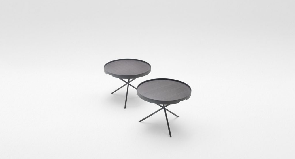 Teo Black Flip side tables, round top and three legs in steel on a white background.