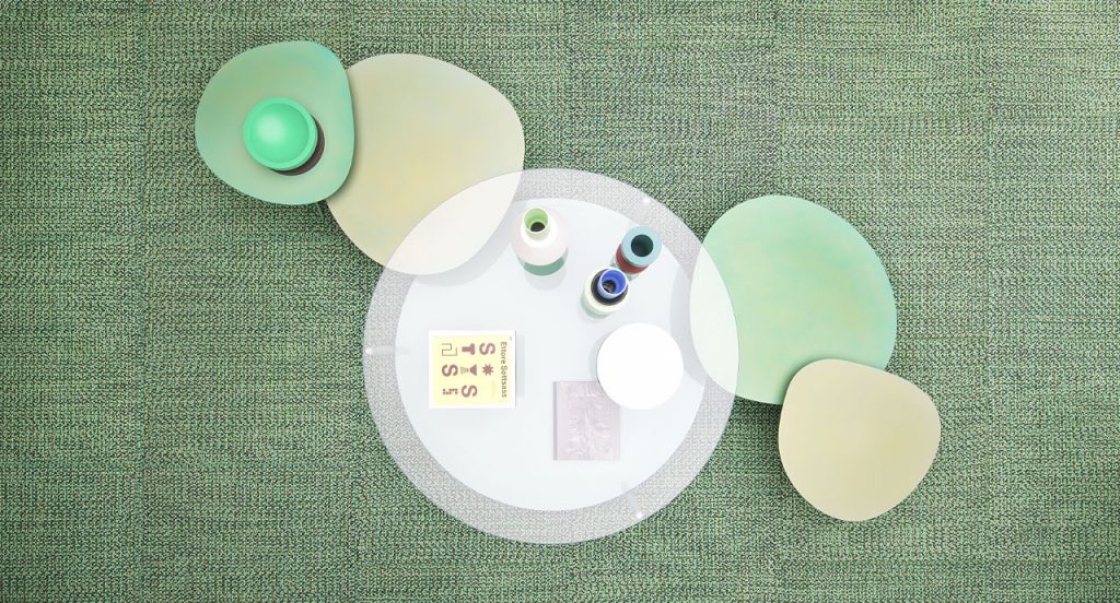 Harvey side table, base and legs in blue heartwood, lower surface in in blue fiber, top in transparent glass in a living room.