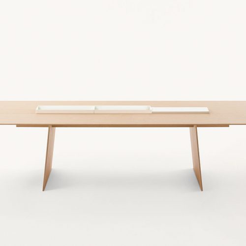 Kanji Dining Table, top in natural fibreboard and two legs in wood and threewhite metal trays on a white background.