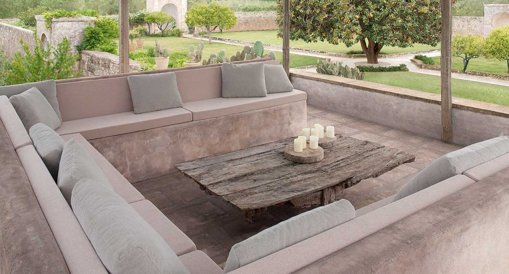 Ten Outdoor Cushions with beige upholstery in a terrace.