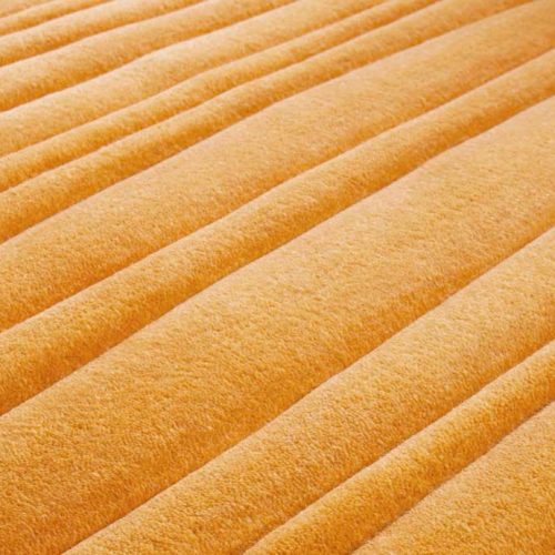 Orange Dune rug with irregular lines like pattern.