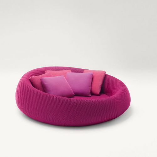 Ease round seating, upholstery in purple on a white background.