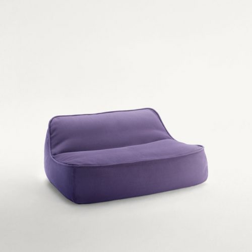Float Chaise, upholstery in purple fabric on a white background.