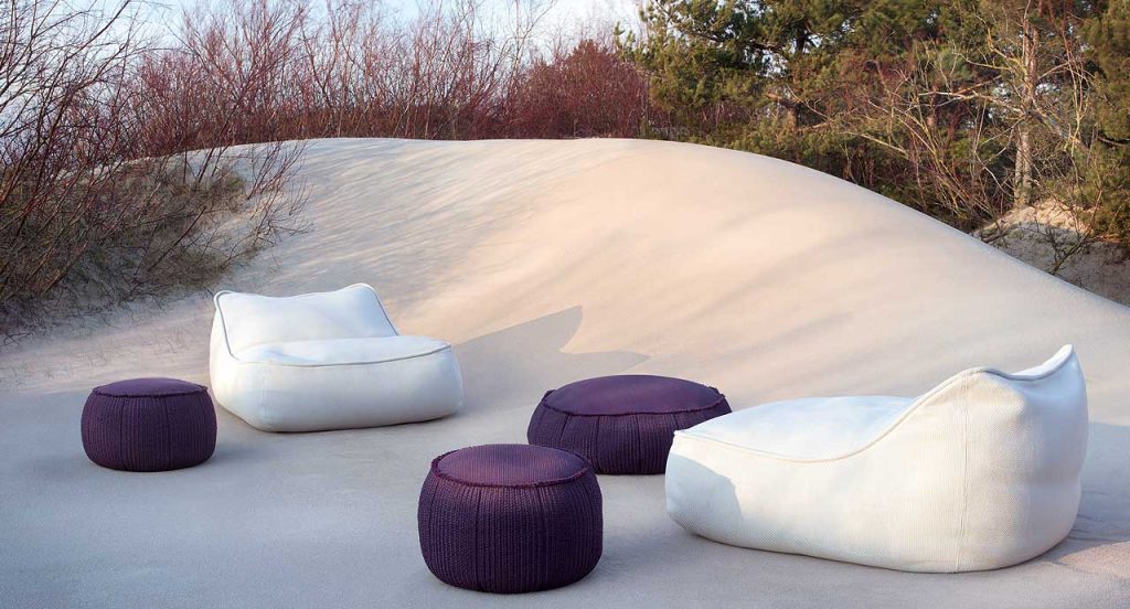 Two Float Chaises, upholstery in white fabric in a terrace.