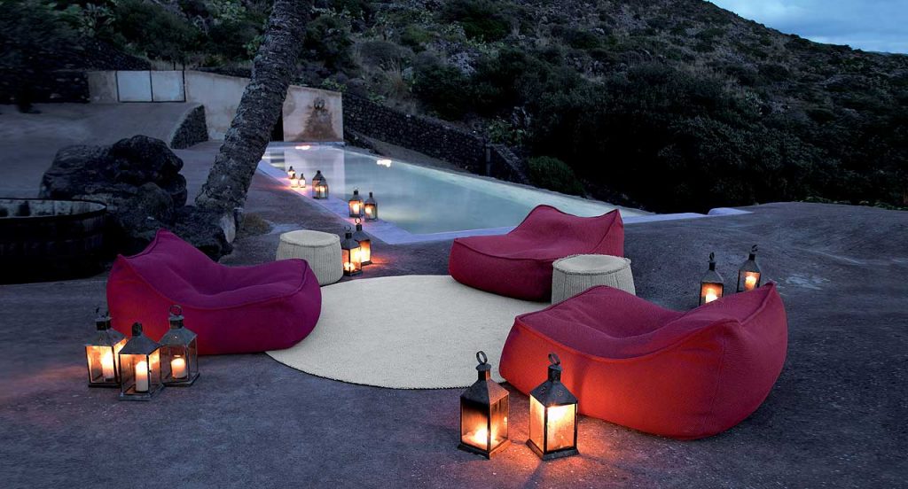 Three Float Chaises, upholstery in red fabric in a terrace.