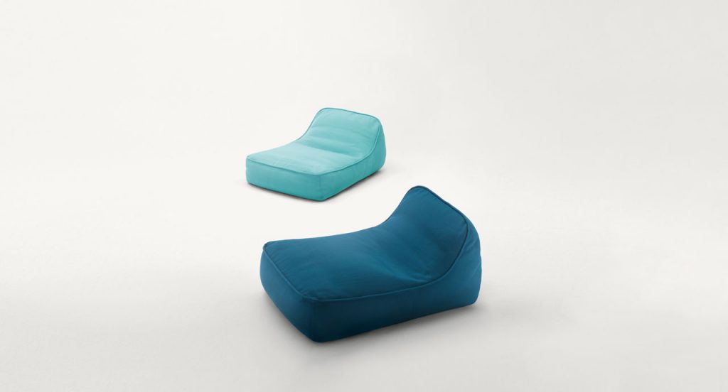 Two Float Chaises, upholstery in blue fabric in a terrace.