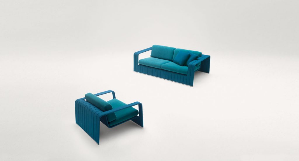 Blue Frame Sectional sofa, upholstery in rope braids with four cushions on a white background.