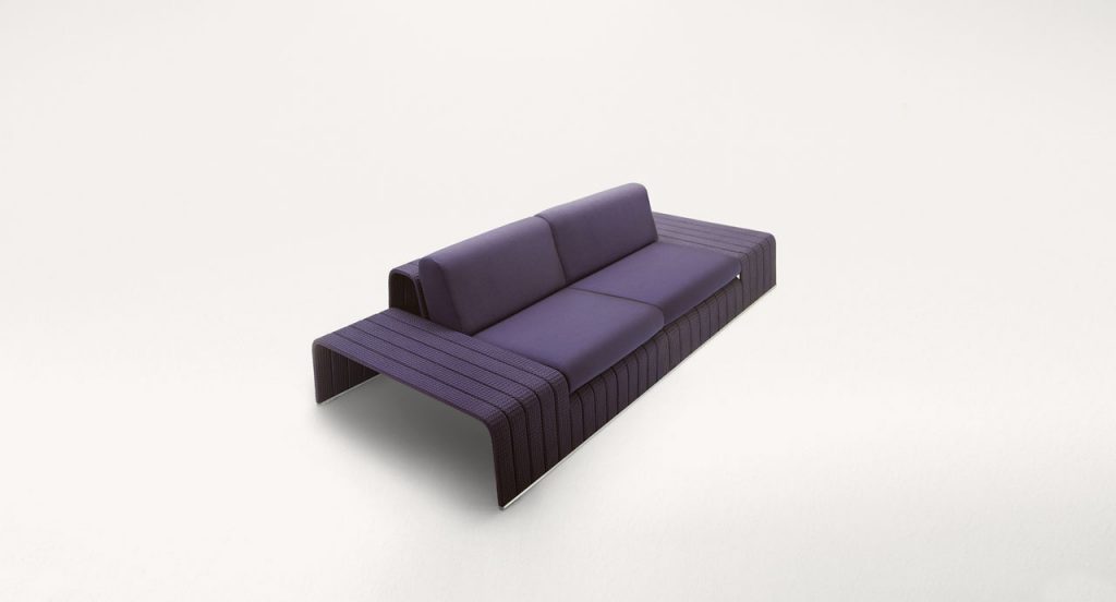 Purple Frame Sectional sofa, upholstery in rope braids with four cushions on a white background.