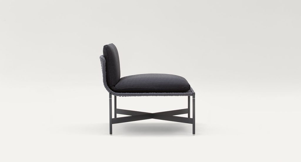 Black Heron Stool, structure and four legs in steel, upholstery in rope cord, cushion in black on a white background.