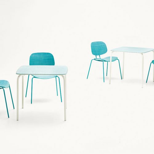 Two Lido Coffee Tables, structure and four legs in white steel, top in blue diade with chairs on a white background.