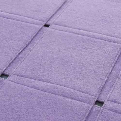Purple Net rug made of parallel strips felt.