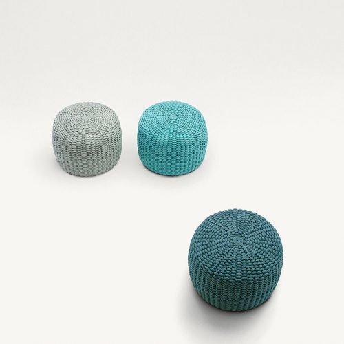 Three Nido Poufs, upholstery of rope cord, two in blue and one in grey on a white background.