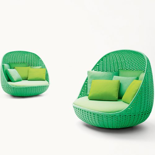 Two Orbitry Armchairs structural weave of flat braid in green Rope yarn with cushion on a white background.