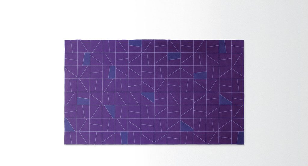 Rectangular Origami rug made of felt, squares and diagonal stitching in purple and grey colors on a white background.