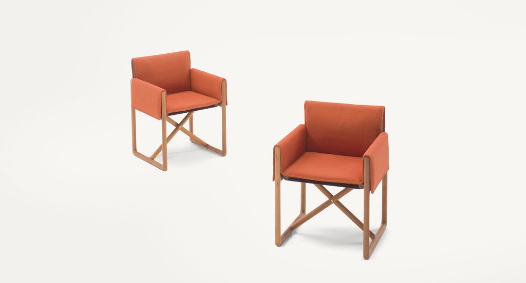 Two Portofino Outdoor Chairs with armrests and little armchair, structure and chair in natural heartwood, upholstery in orange fabric on a white background.