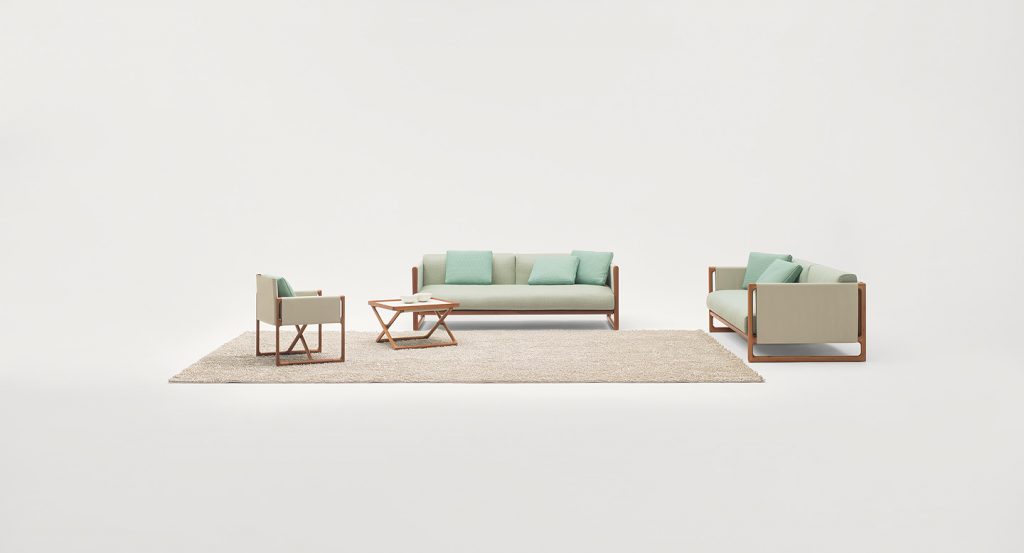 Two Portofino Outdoor Sofas, structure in natural heartwood, cushions in white polyester in a living room.