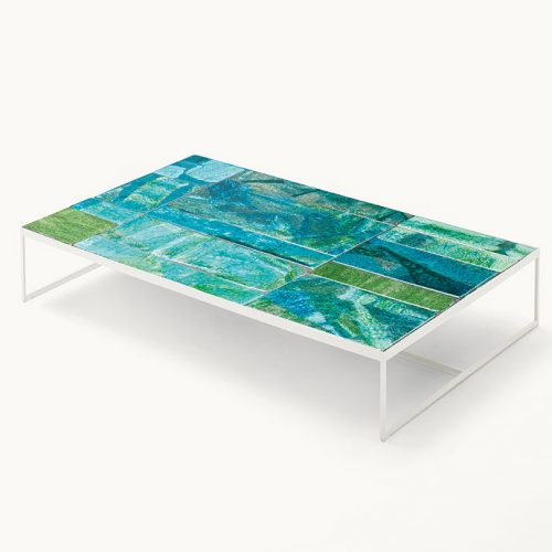 Blue and green Sciara Coffee Table, structure in white steel, top in lava stone on a white background.
