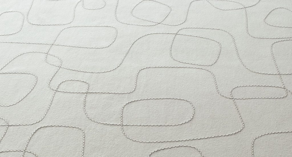White Script rug, abstract script like pattern in wool.