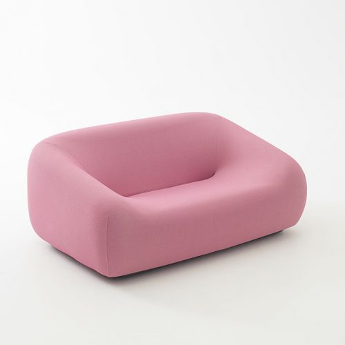 Smile Indoor Sofa, two seater, upholstey in pink aero fabric on a white background.
