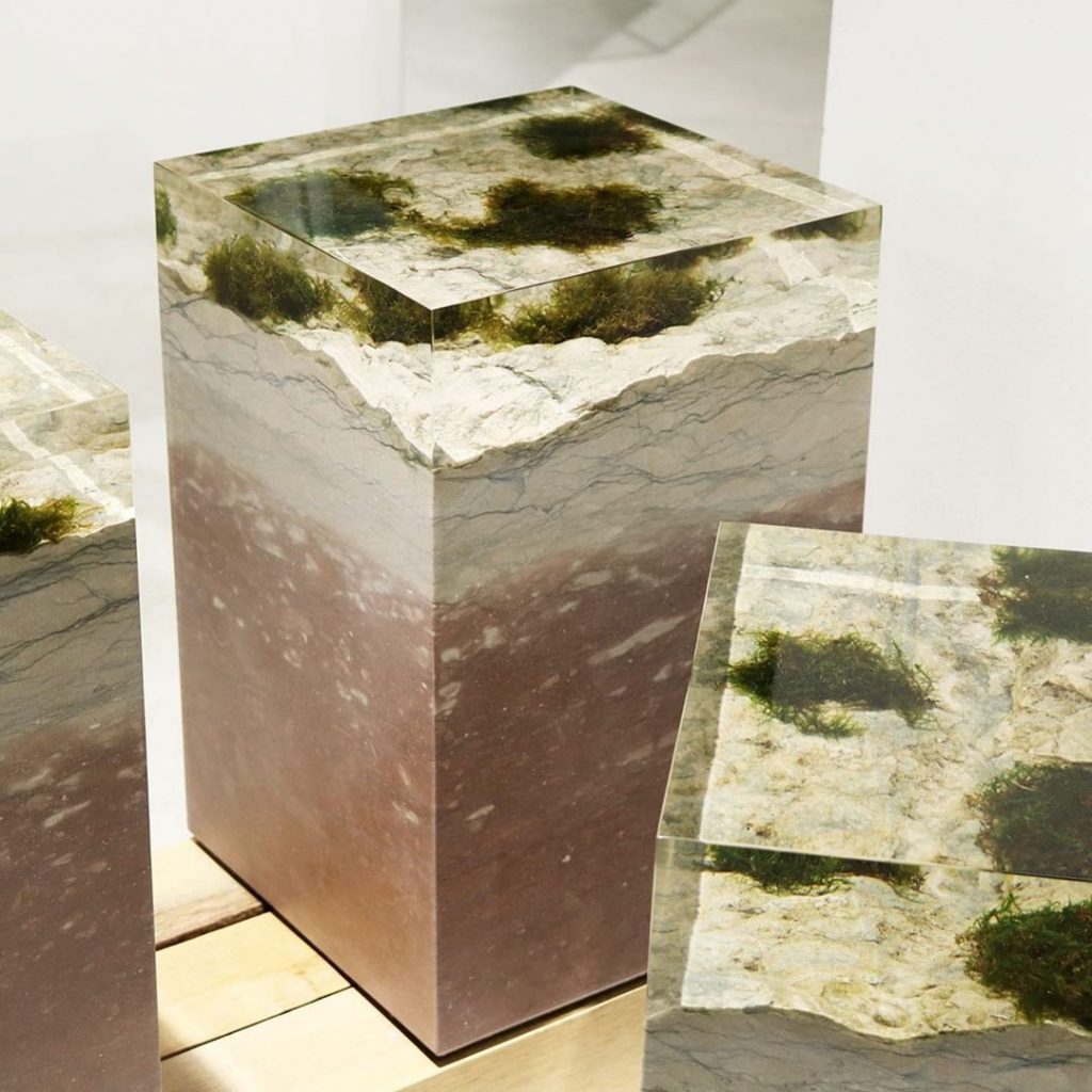 Dolomyth Stool/Side Table with a rectangular shape, made of natural stone and featuring transparent resin inlays, on a white background.