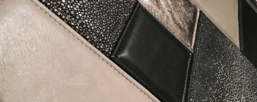 Absolute mosaic with square patterns in brown, gray, white.