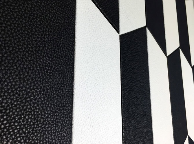 Sense mosaic in white and black tones with a polygonal pattern.