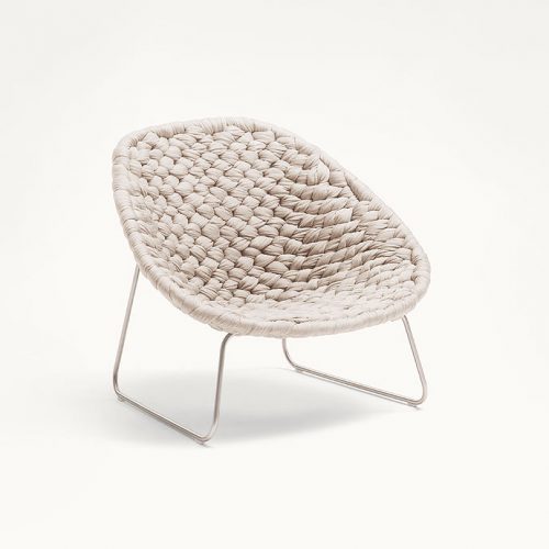 Shito Outdoor Armchair, structure and legs in steel, upholstery in tubular knit on a white background.