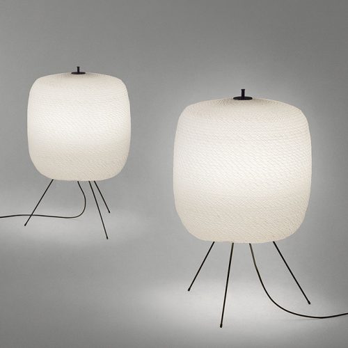 Two Shoji floor lamps, cover in semi transparent polyester cord and three black steel legs on a white background.