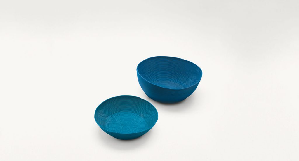 Two blue Sika bowls made in rope cord on a white background.