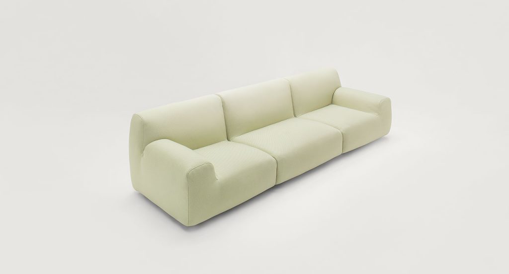 White Welcome modular seating system with armrest backrest, three seats, on a white background.