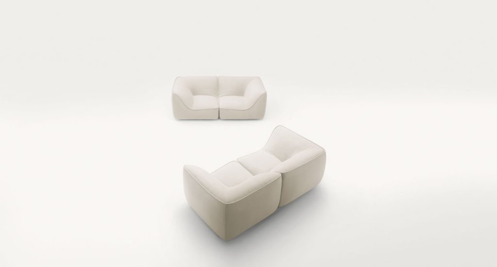 Two white So Sofas, Two seater, fabrics upholstery, wood base on a white background.