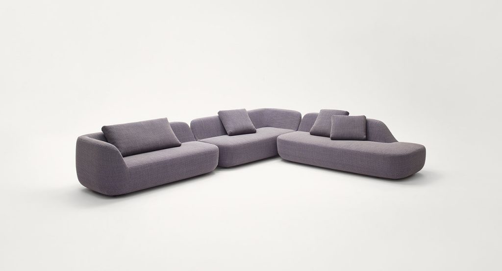 Three Uptown Sofas with hig back, two with armrest, grey fabrics upholstery on a white background.