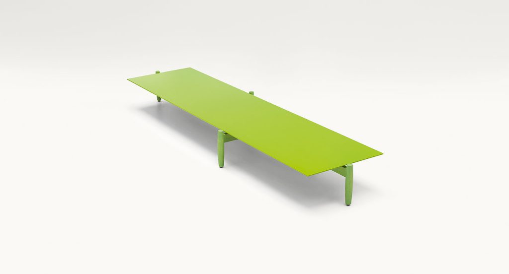 Green Tapio Side Table, structure in ash heartwood and top in wood fiber with four legs on a white background.