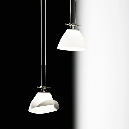 A couple of Yayaho Element fourteen lights hanging from a ceiling in front of a white and black background