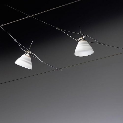 Yayaho Element sixteen lamps hanging from a wire in a dark room