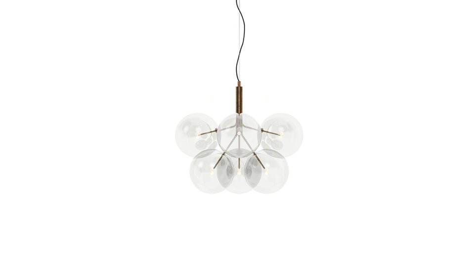 Suspension lamp with hand-burnished brass structure, available with six transparent blown glass spheres on a white background