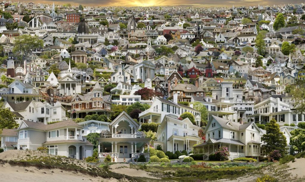 C print mounted on aluminum with design on houses in a sunset