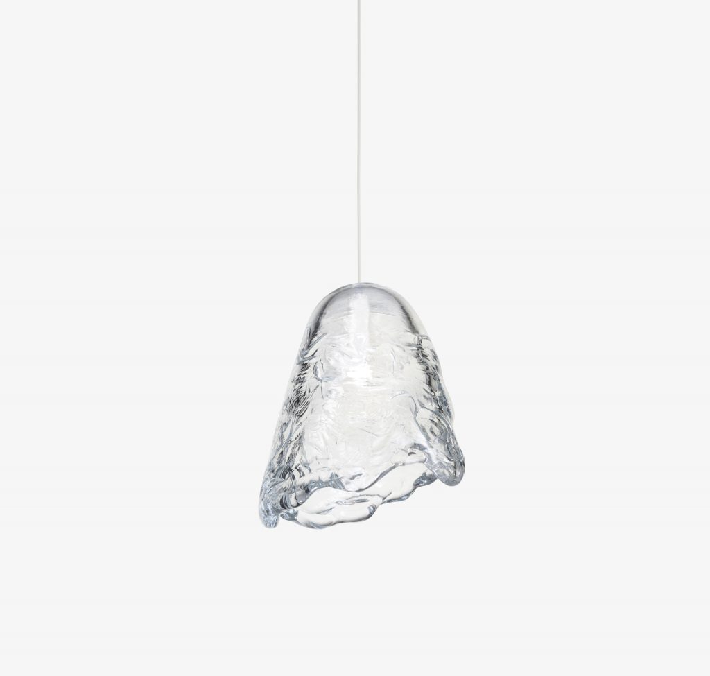 small ceiling lamp made of blown glass in the shape of a drop of water on a white background