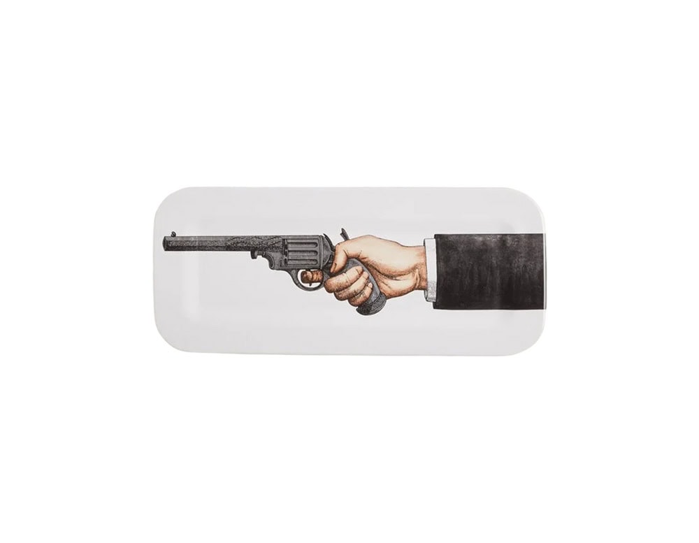 A striking rectangular tray featuring a surreal illustration of an outstretched arm holding a revolver, blending bold imagery with a playful artistic twist.