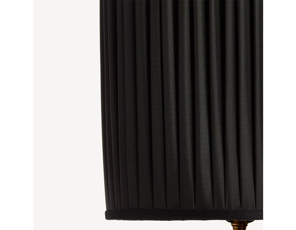 Sophisticated black pleated shade with a timeless cylindrical form, adding depth, texture, and modern elegance to your lighting design.